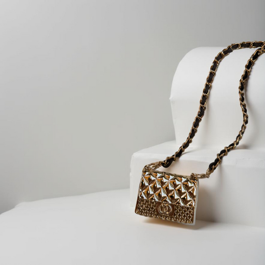 The Secret Locket Bag in Gold