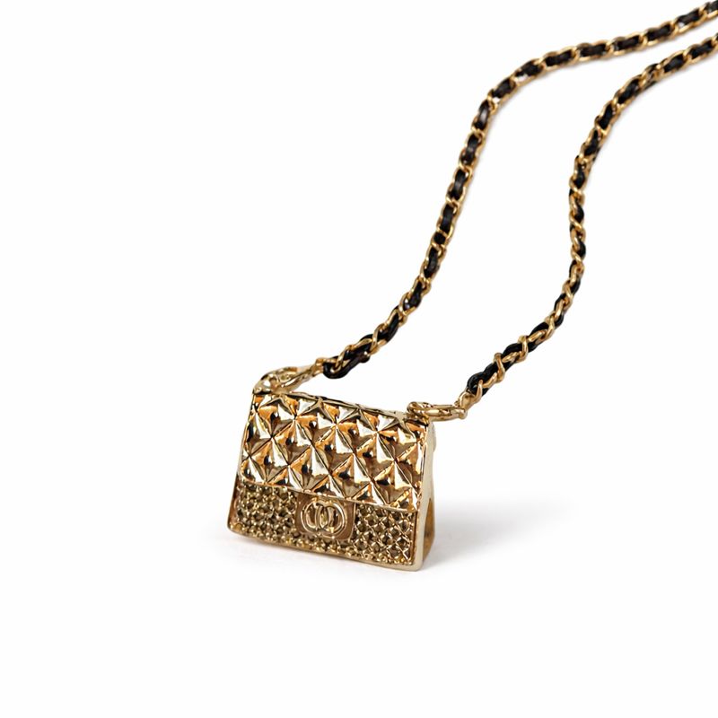 The Secret Locket Bag in Gold